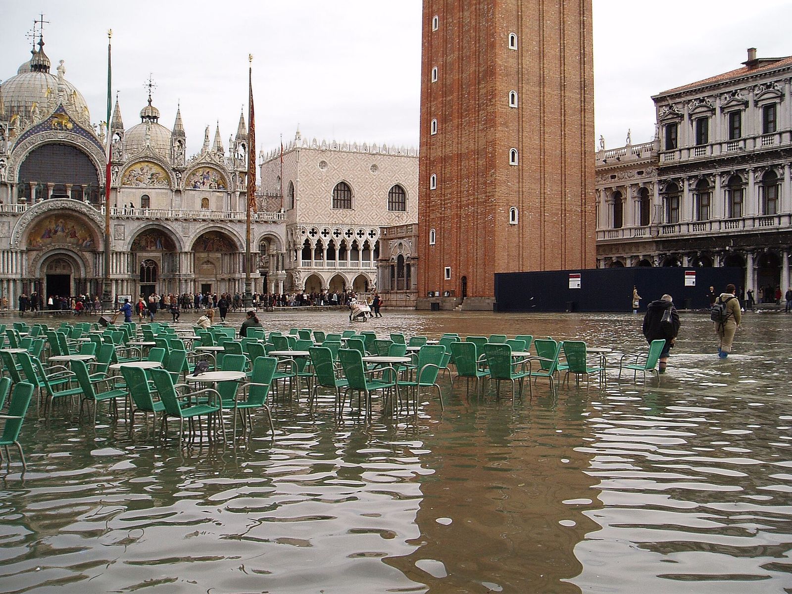 Piazza San Marco flooded during acqua alta, with the basilica behind