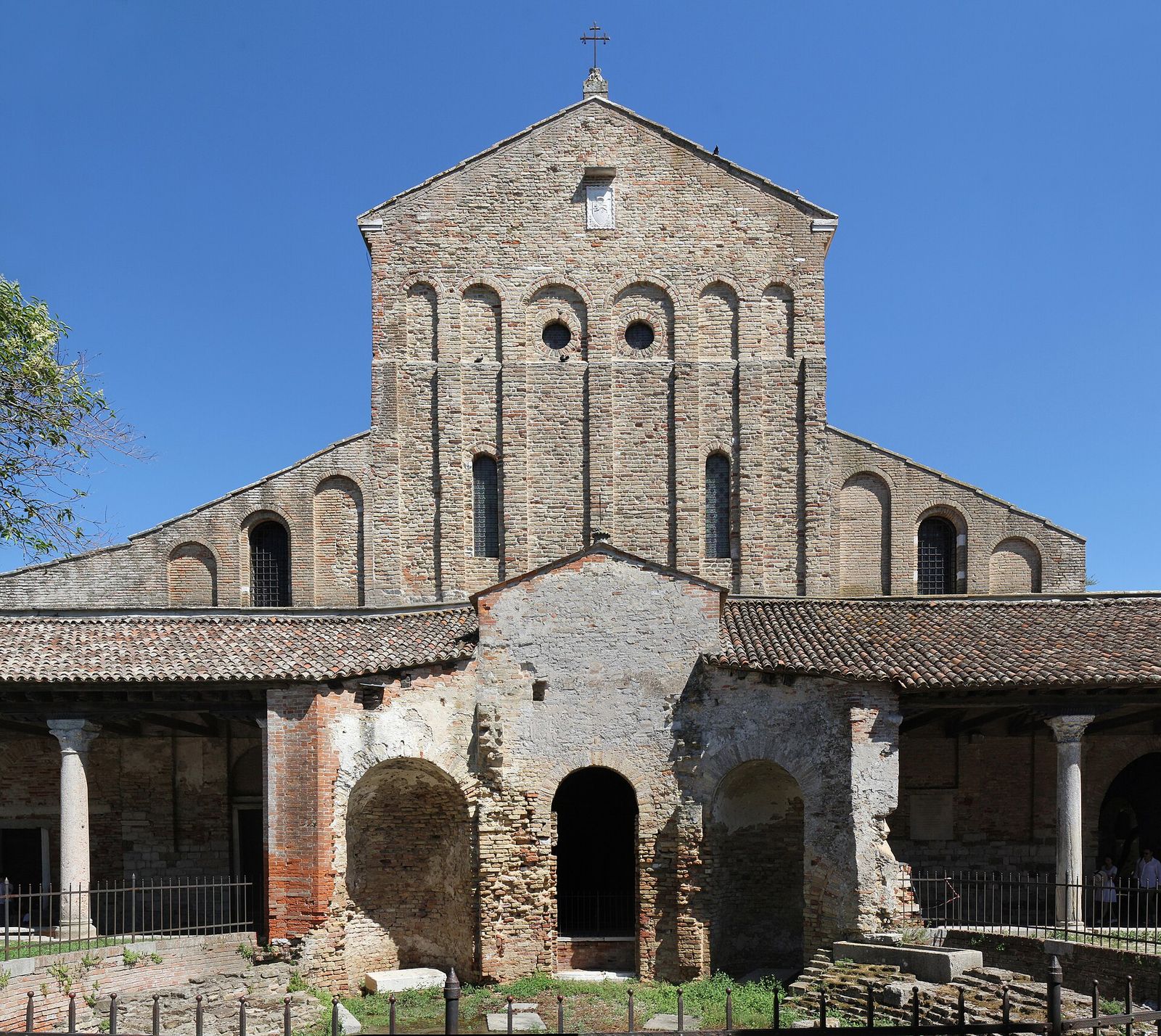 The plain brick façade of the Cathedral of Santa Maria Assunta on Torcello